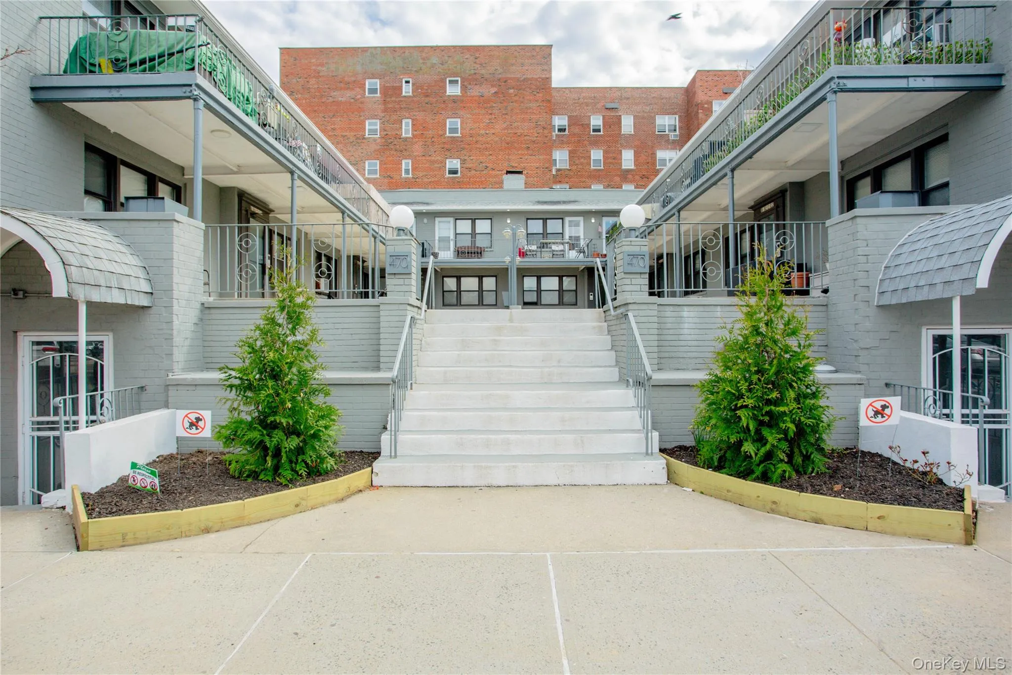 View of community featuring stairs and a balcony View of community featuring stairs and a balcony
