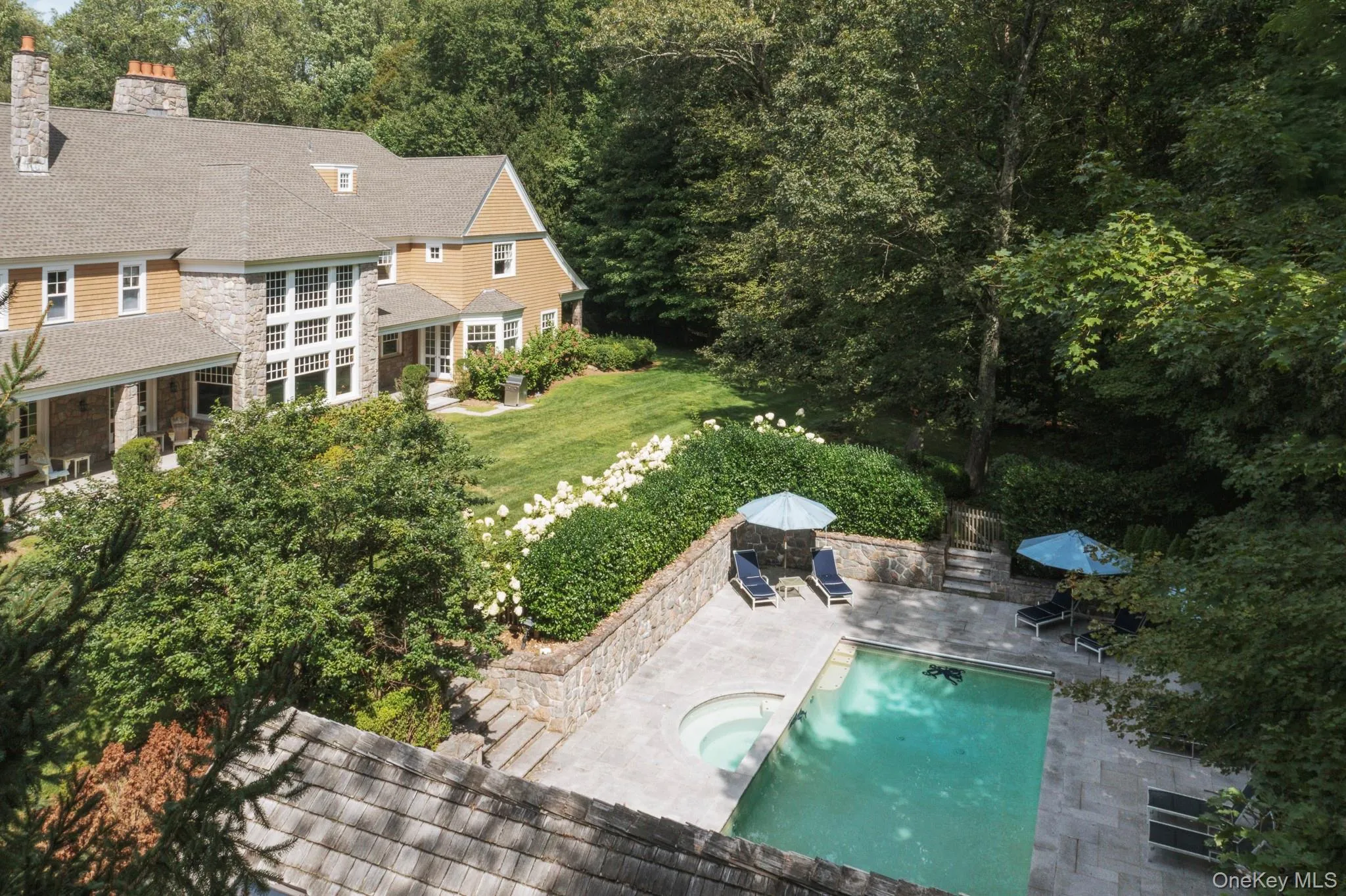 View of subject property with a pool area View of subject property with a pool area