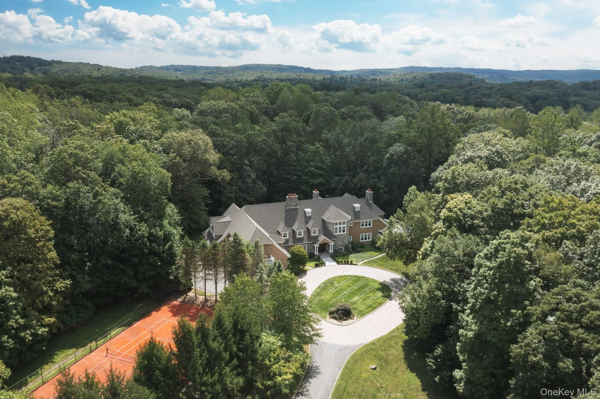 View of subject property with a forest View of subject property with a forest