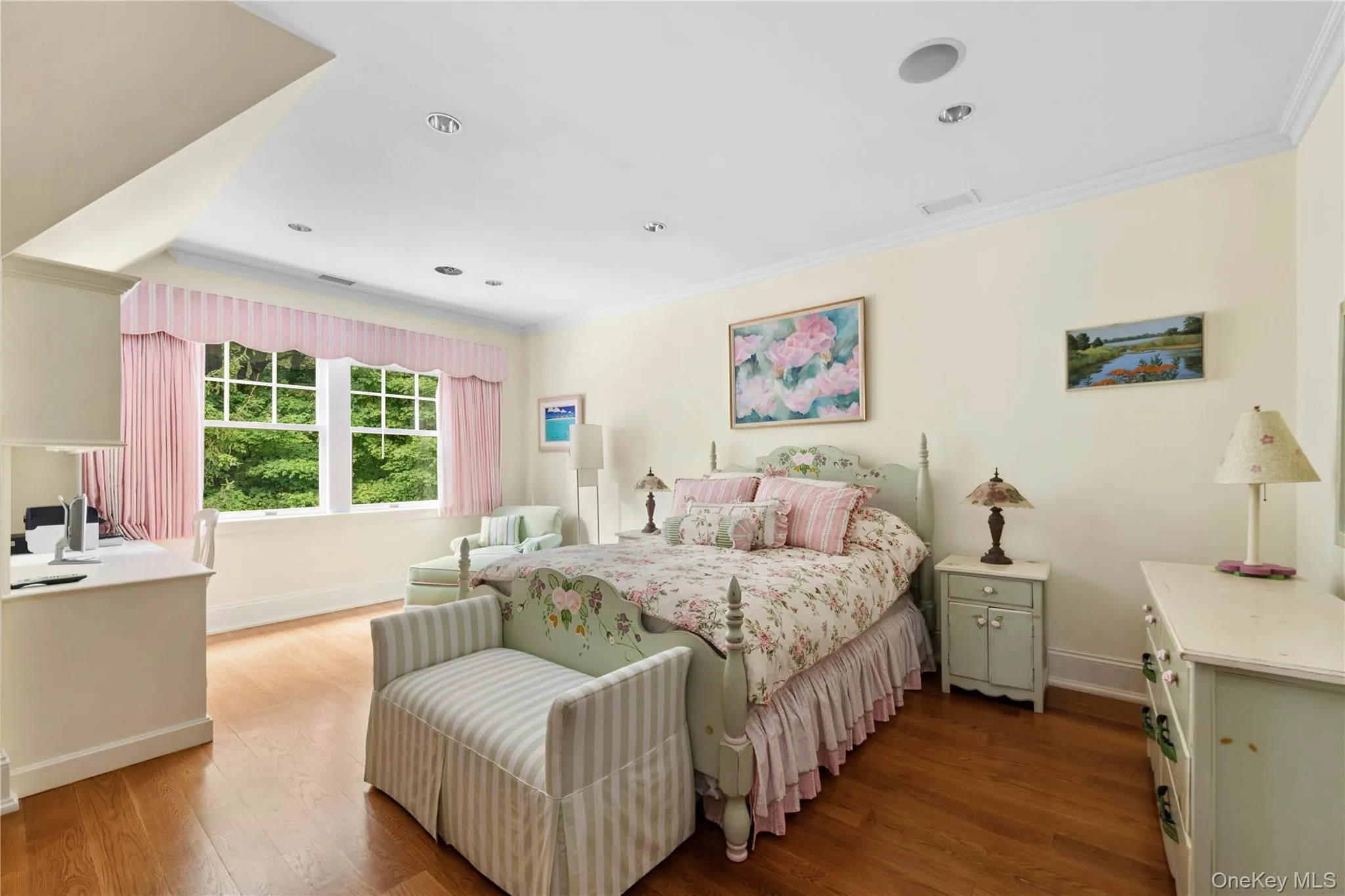 Bedroom featuring ornamental molding, dark wood-style floors, and recessed lighting Bedroom featuring ornamental molding, dark wood-style floors, and recessed lighting