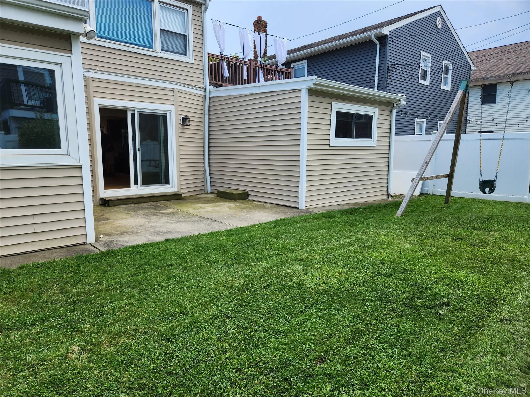 View of yard with a patio View of yard with a patio