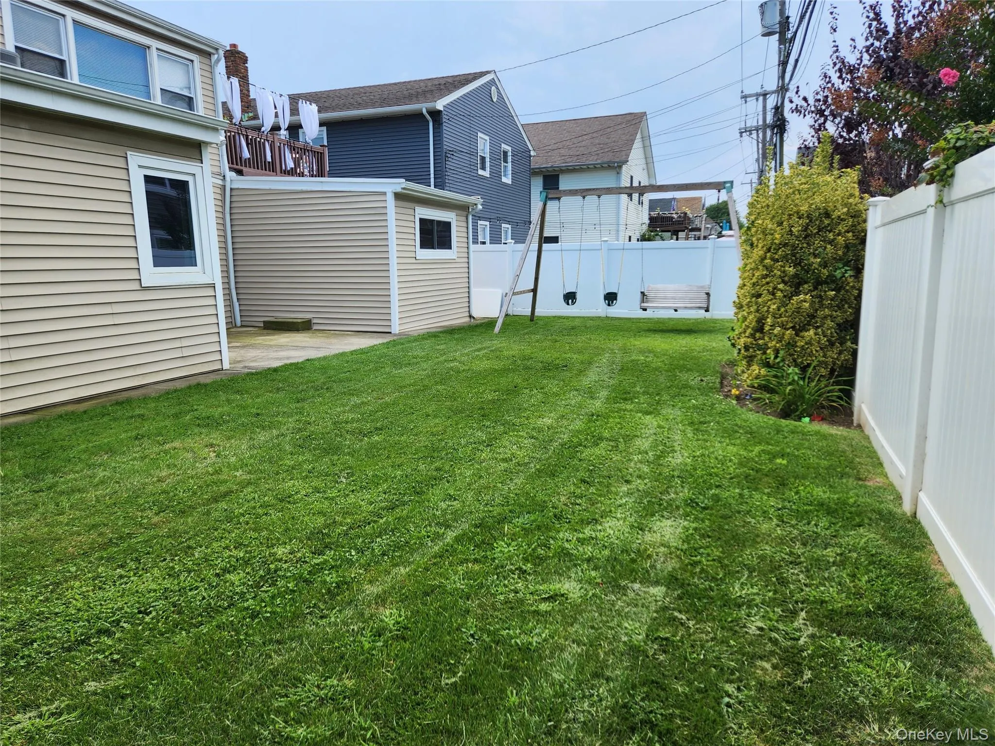 Fenced backyard featuring a patio Fenced backyard featuring a patio