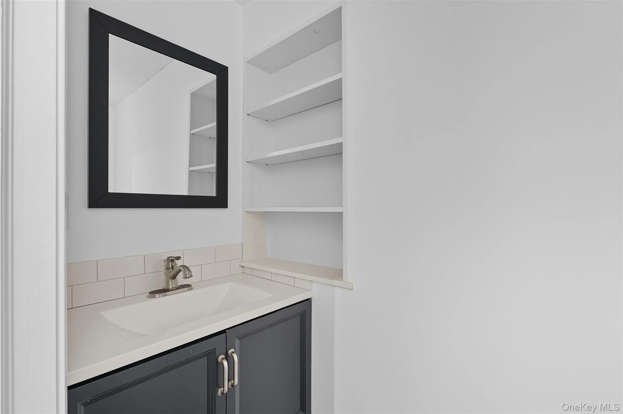 Bathroom featuring vanity Bathroom featuring vanity