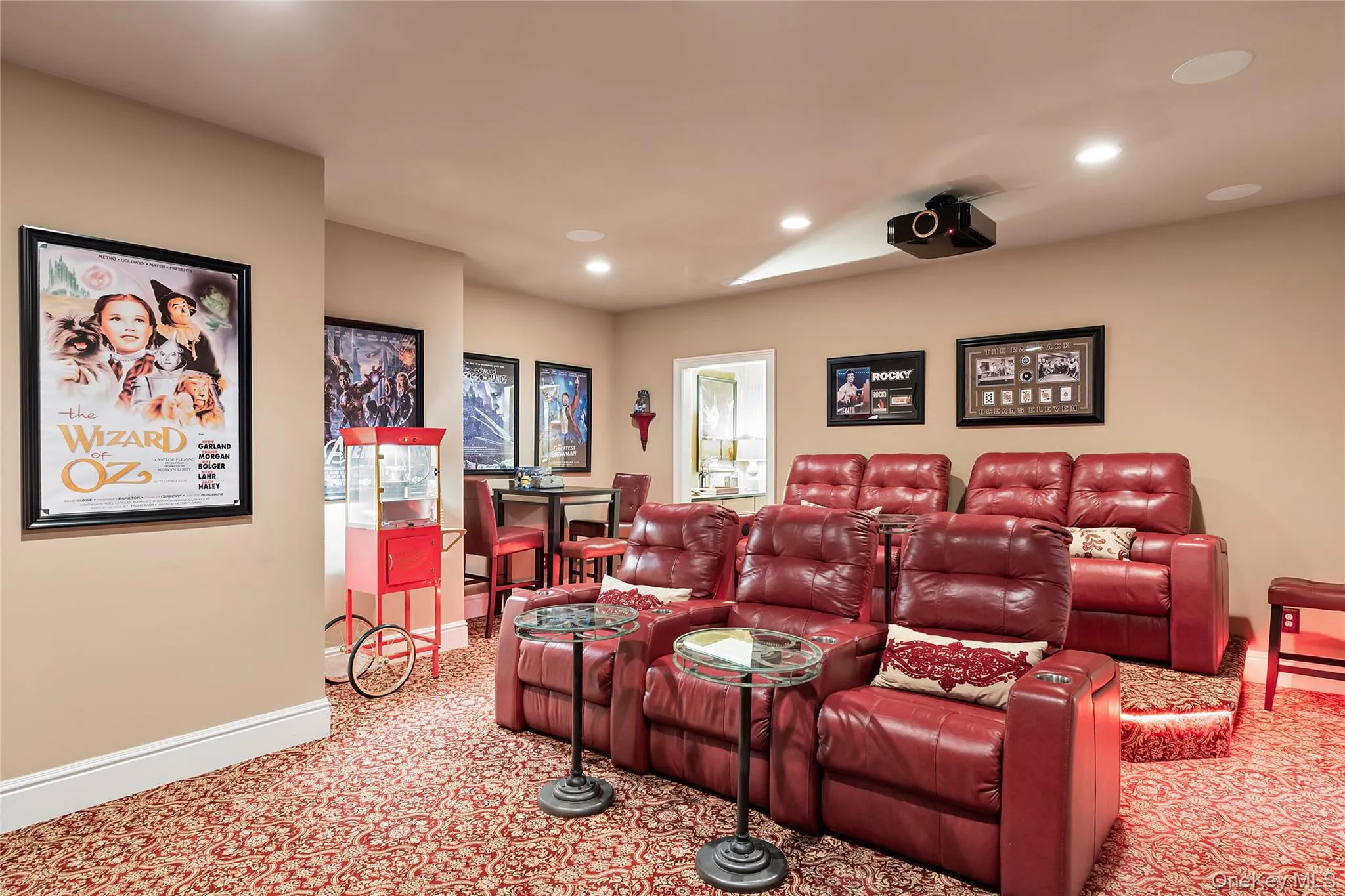 Cinema room with recessed lighting and light carpet Cinema room with recessed lighting and light carpet