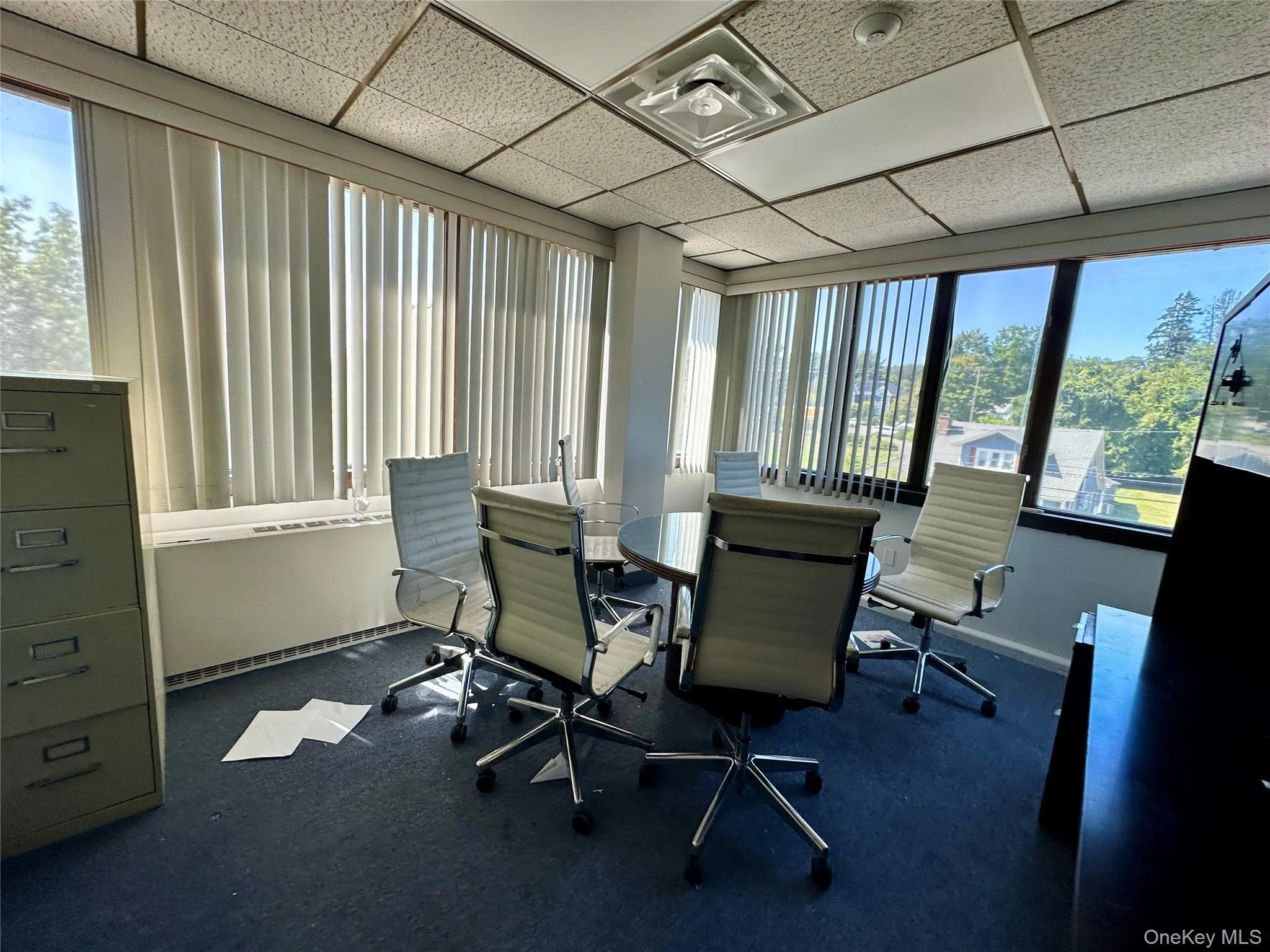 Office with dark carpet and a drop ceiling Office with dark carpet and a drop ceiling