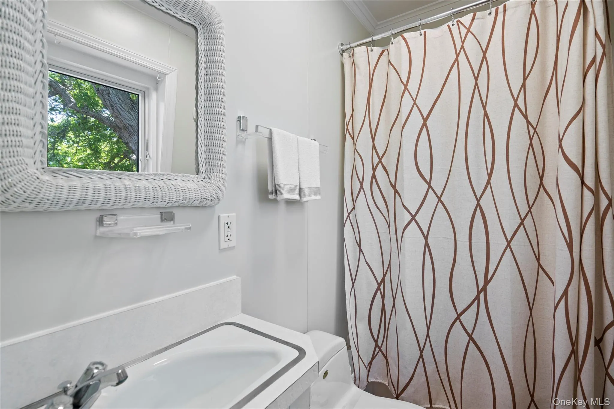 Full bath with a shower with shower curtain and vanity Full bath with a shower with shower curtain and vanity