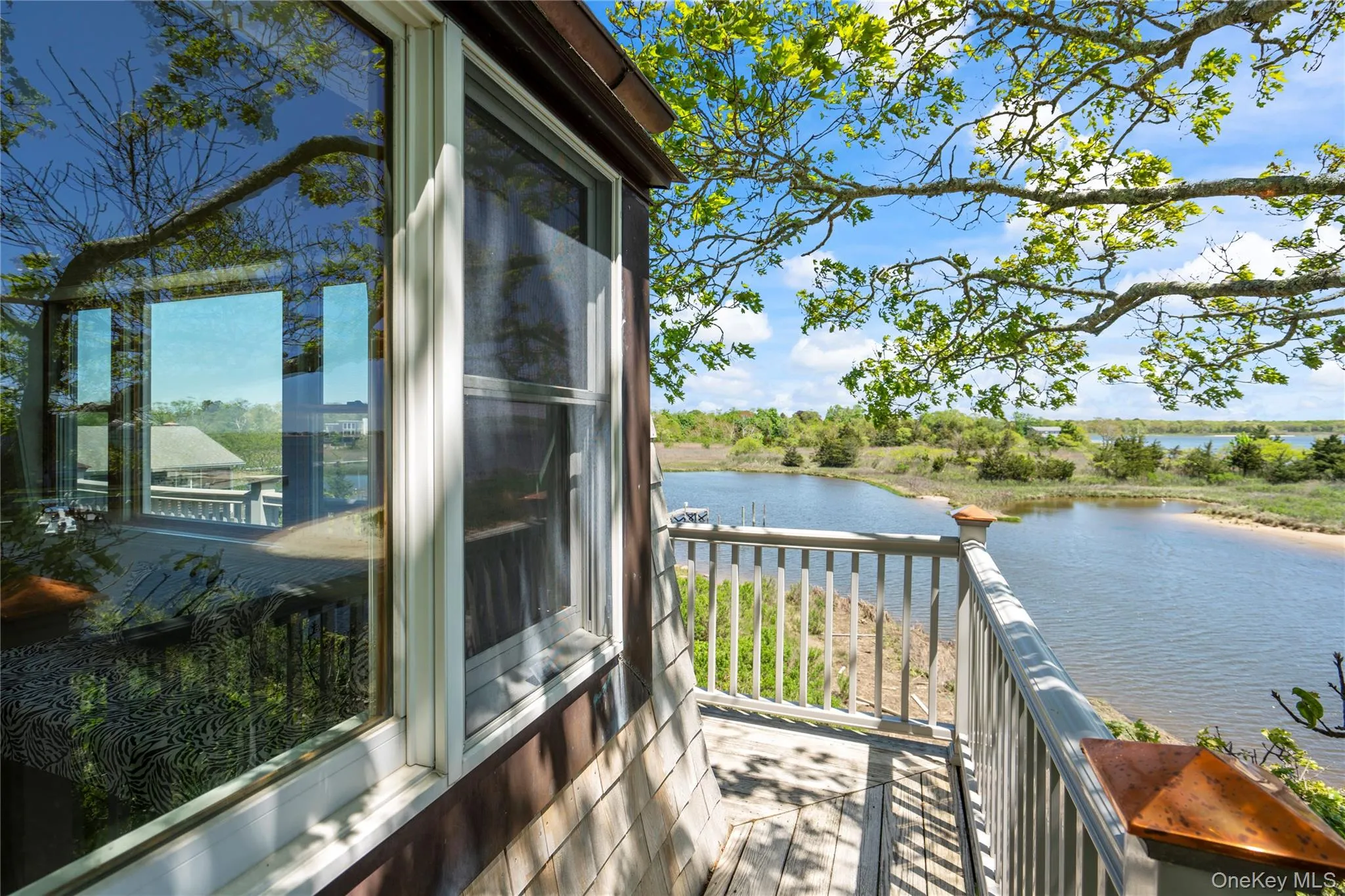 Balcony featuring a water view Balcony featuring a water view