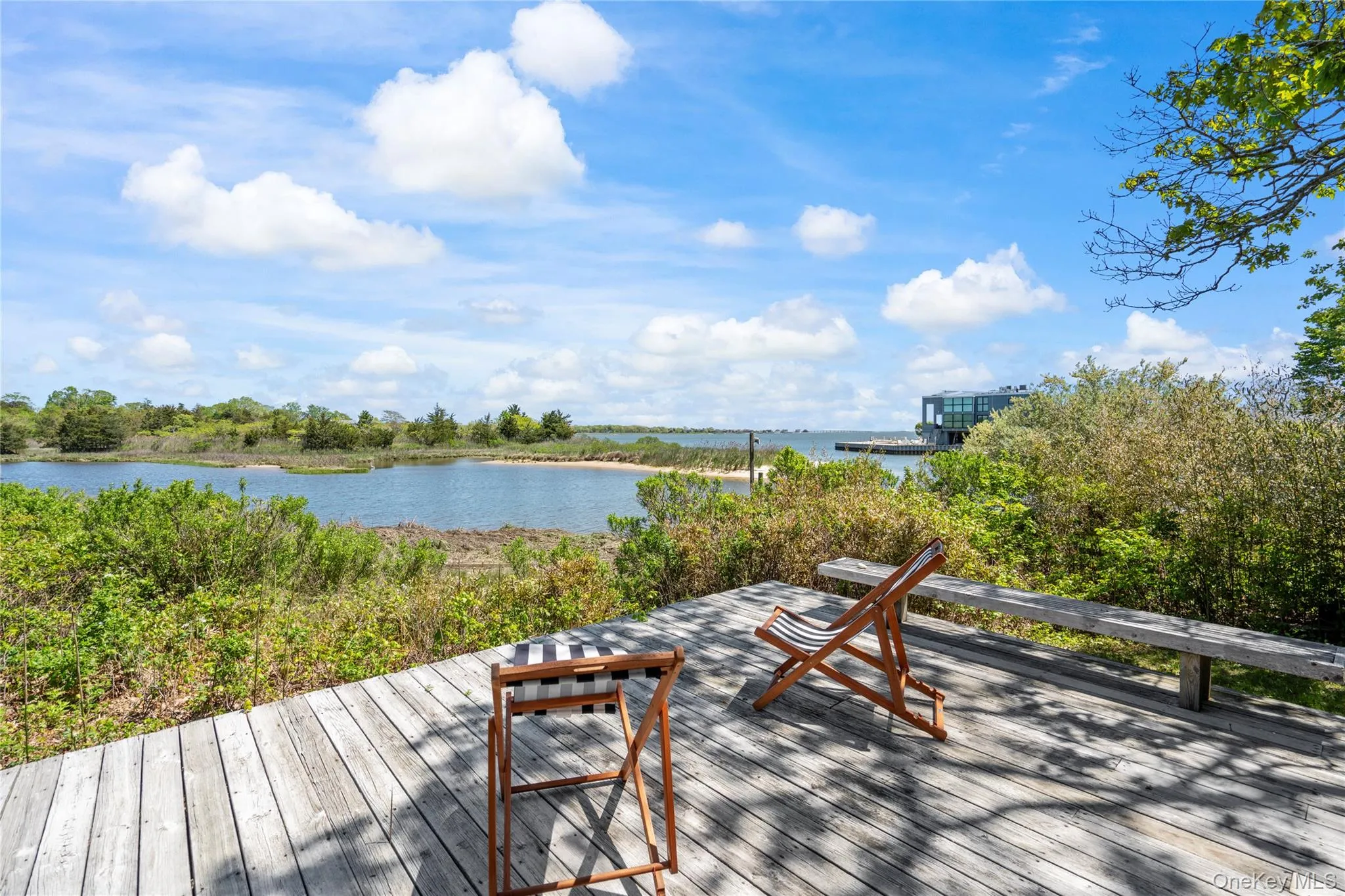 Wooden terrace with a water view Wooden terrace with a water view