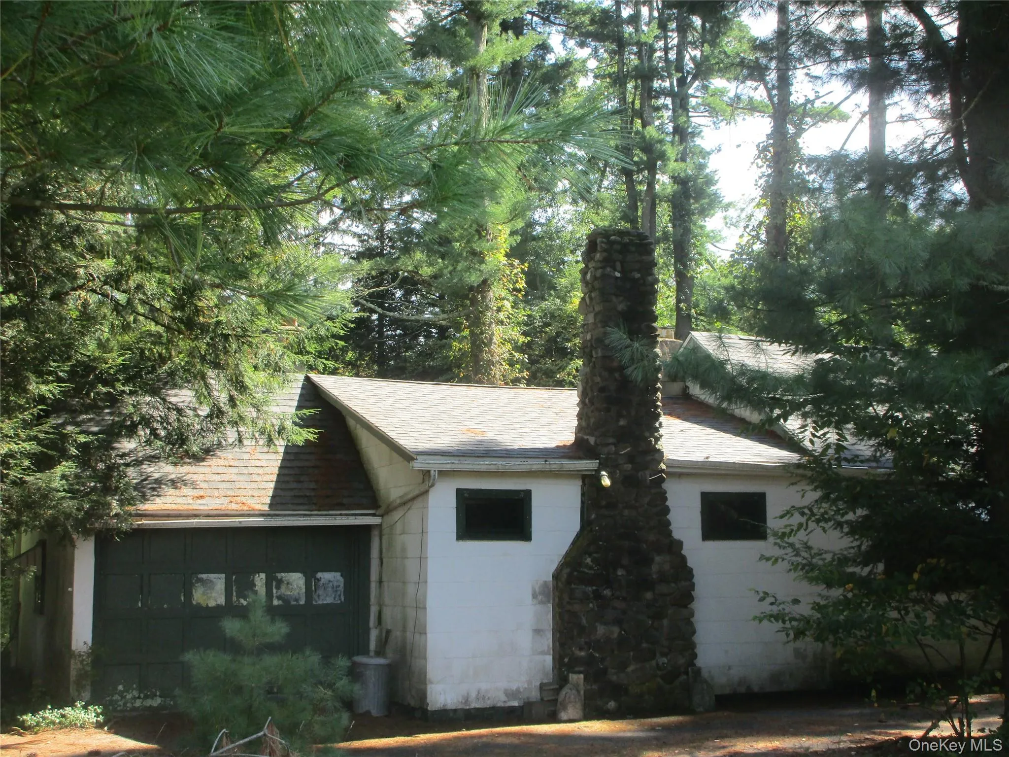 Main House one car garage driveway to garage. Main House one car garage driveway to garage.