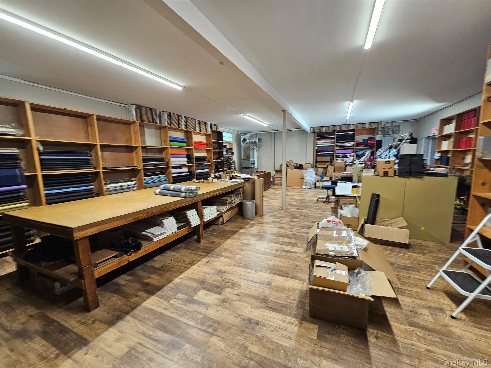 Finished below grade area featuring wood finished floors Finished below grade area featuring wood finished floors