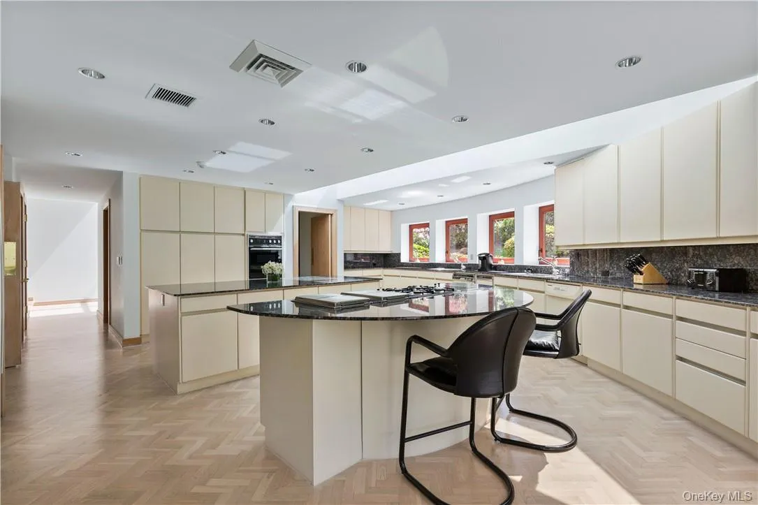 View of Kitchen Featuring 2 Islands for Food Preparation and Eating View of Kitchen Featuring 2 Islands for Food Preparation and Eating