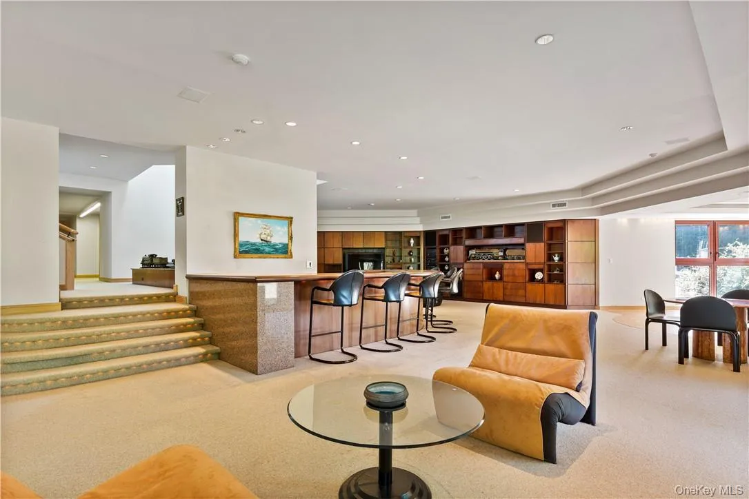 Lower Level Featuring Extensive Built-Ins and Bar Lower Level Featuring Extensive Built-Ins and Bar