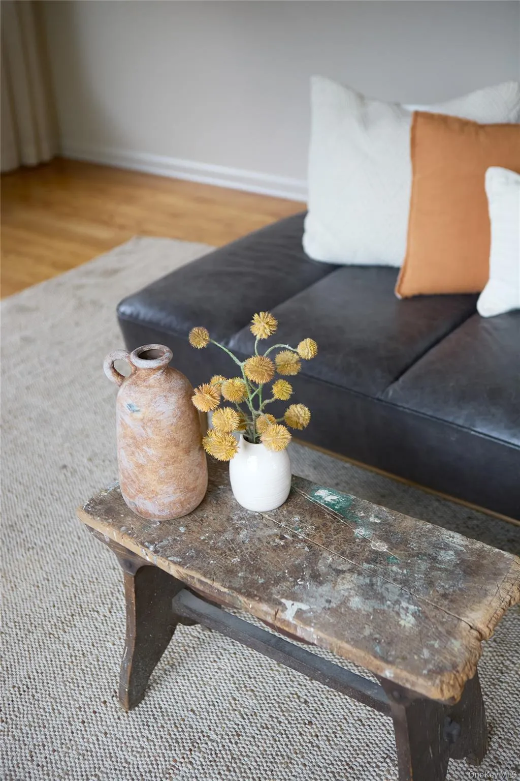 Detailed view of baseboards and wood finished floors Detailed view of baseboards and wood finished floors