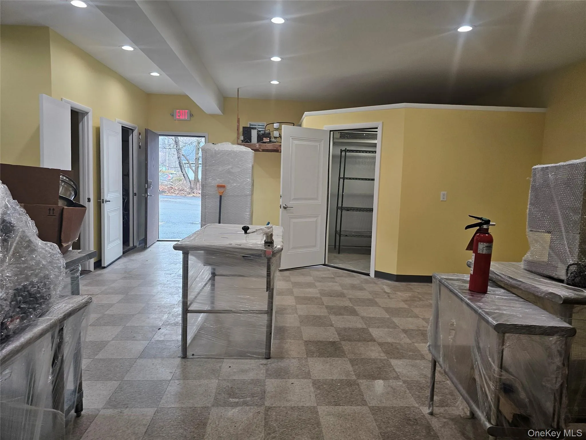 Kitchen with recessed lighting and beam ceiling Kitchen with recessed lighting and beam ceiling