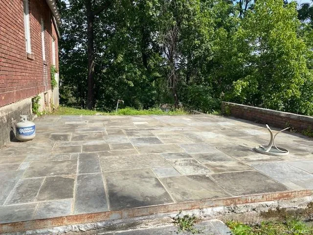 View of patio with view of wooded area View of patio with view of wooded area