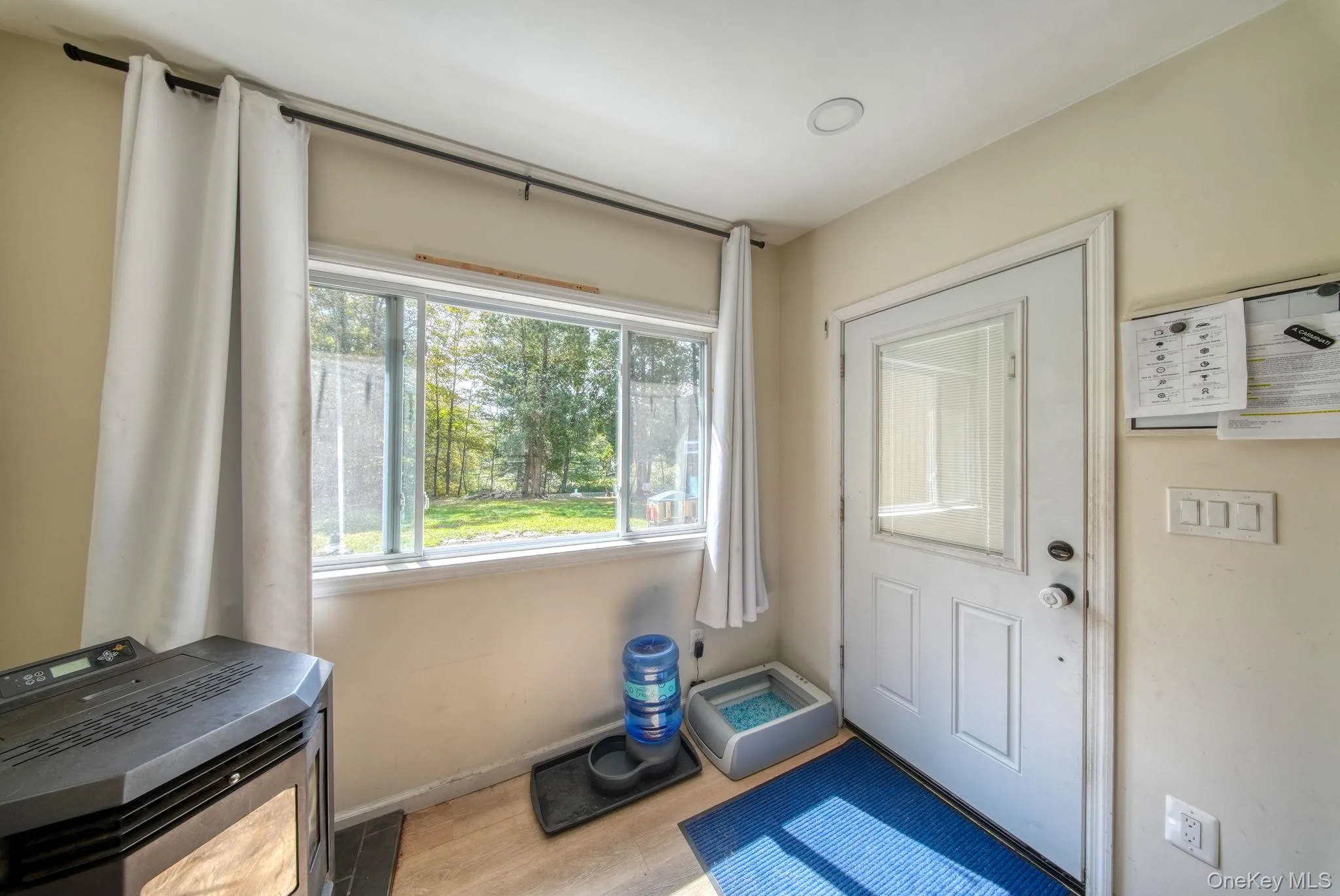 Doorway to outside with baseboards Doorway to outside with baseboards