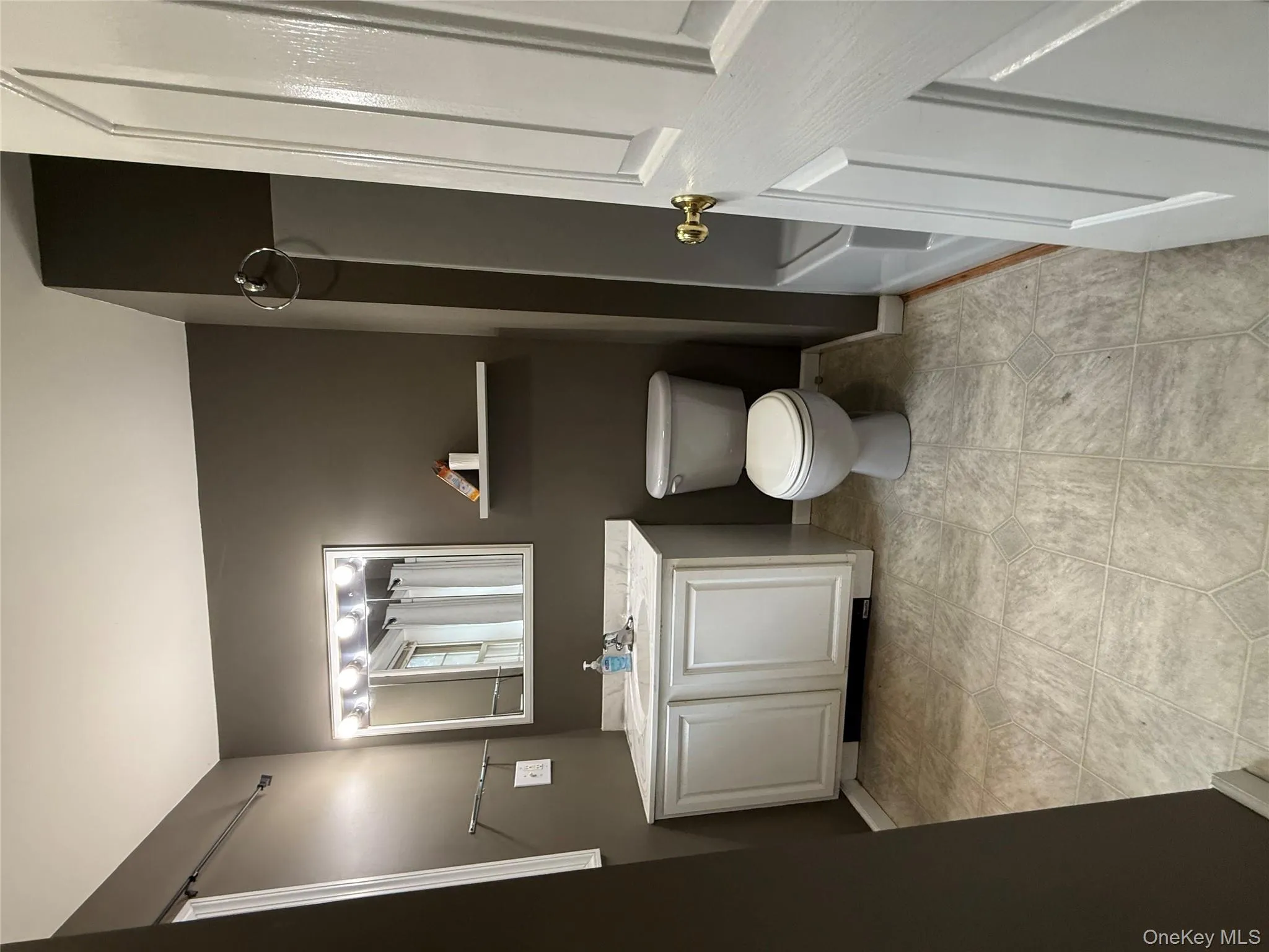 Full bath with vanity, tub / shower combination, and light tile patterned flooring Full bath with vanity, tub / shower combination, and light tile patterned flooring