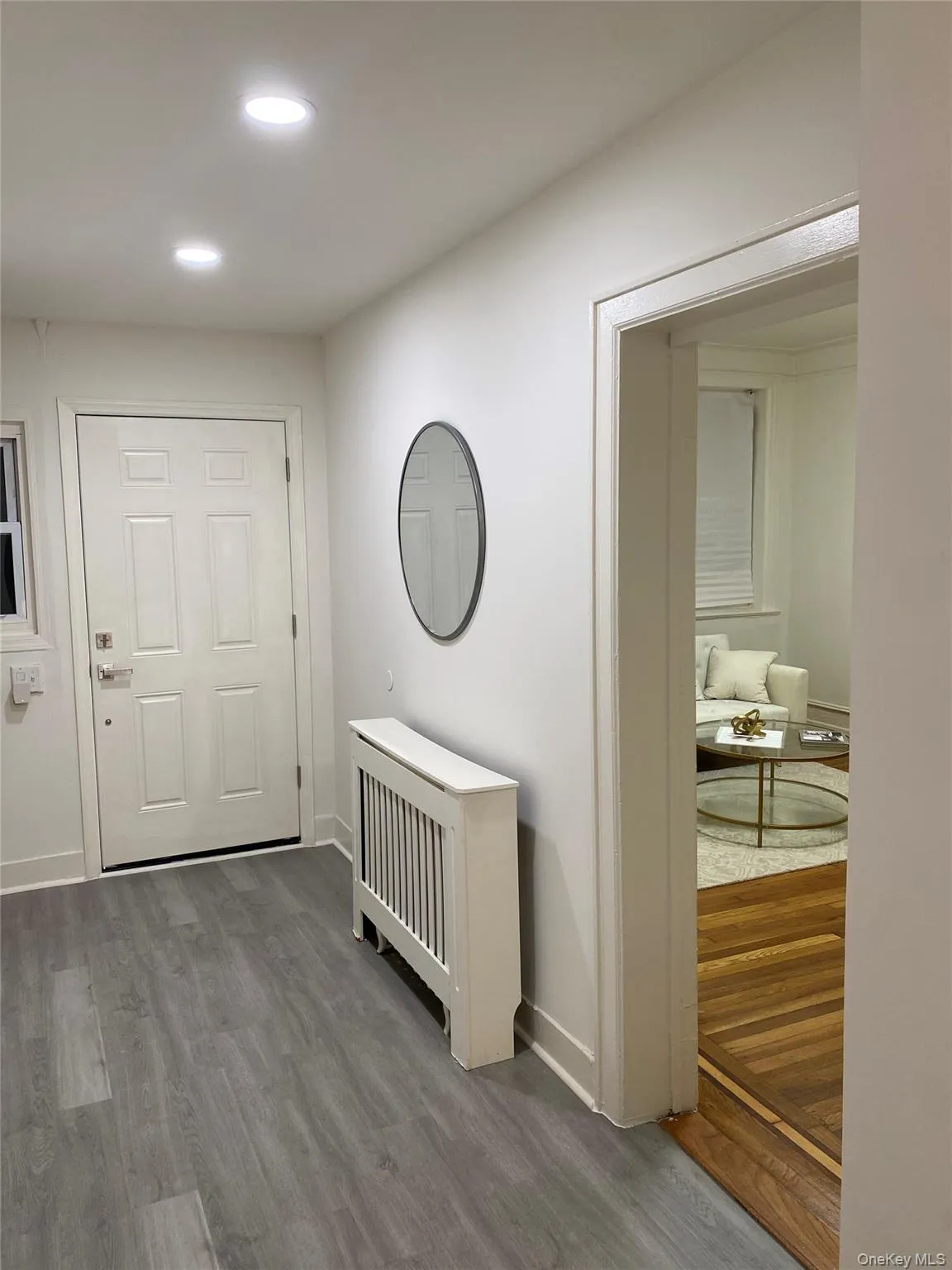 entrance foyer and entrance to living room/dining area entrance foyer and entrance to living room/dining area