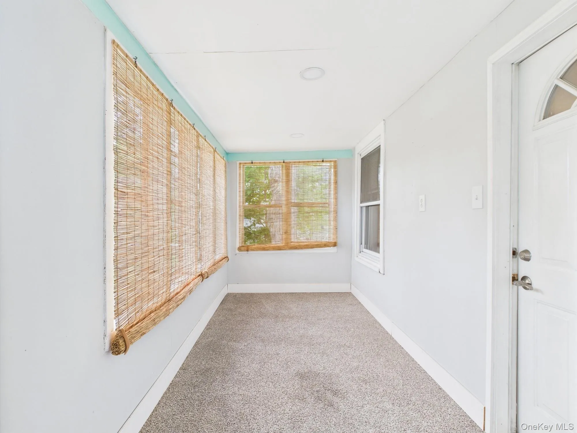 View of unfurnished sunroom View of unfurnished sunroom