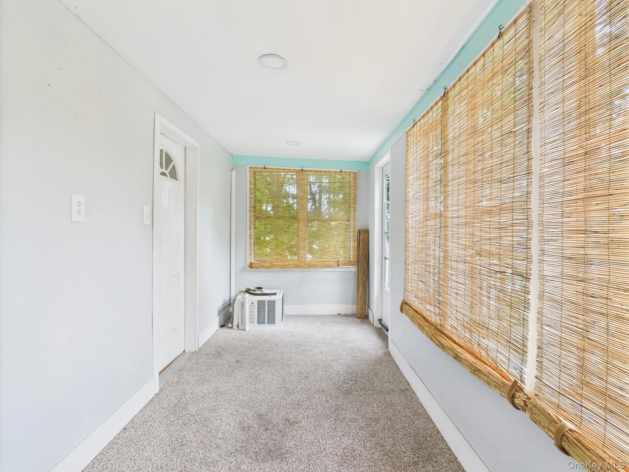 View of unfurnished sunroom View of unfurnished sunroom