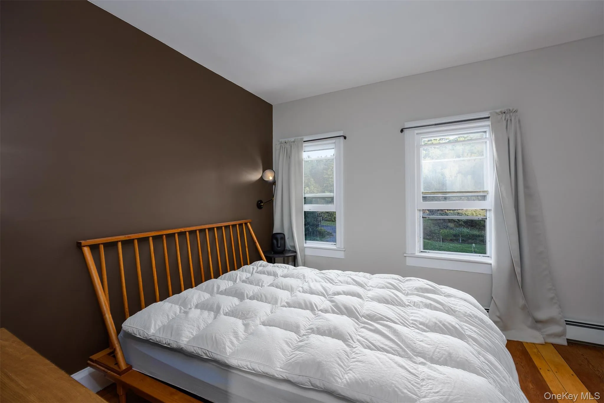 Bedroom with wood finished floors Bedroom with wood finished floors