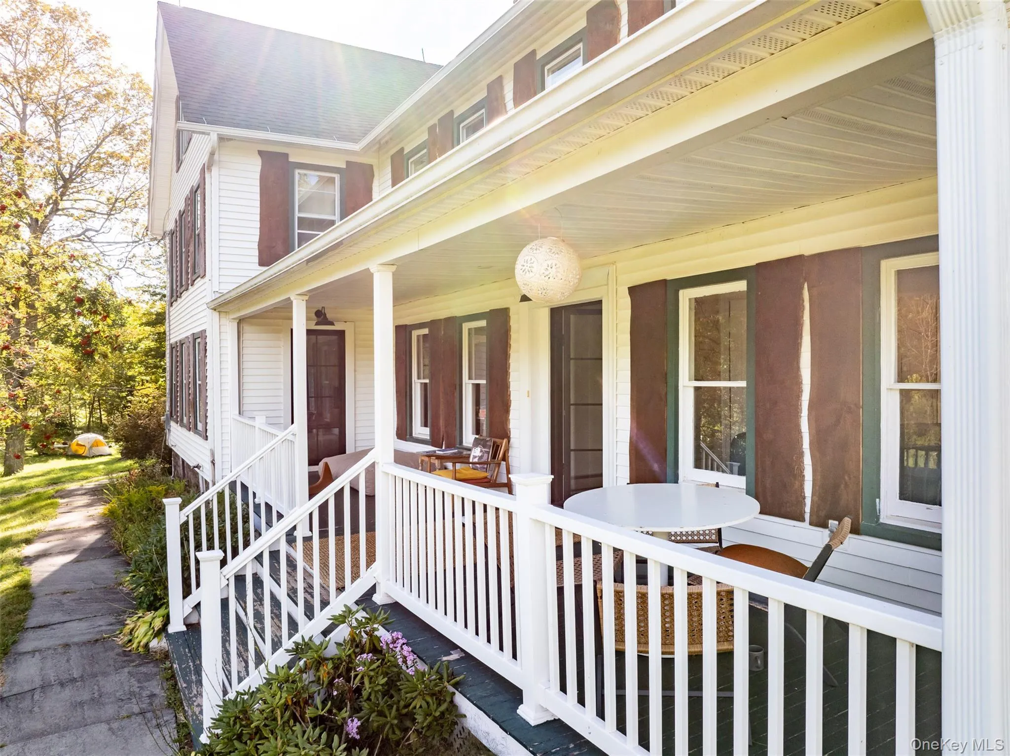Property entrance featuring a porch Property entrance featuring a porch