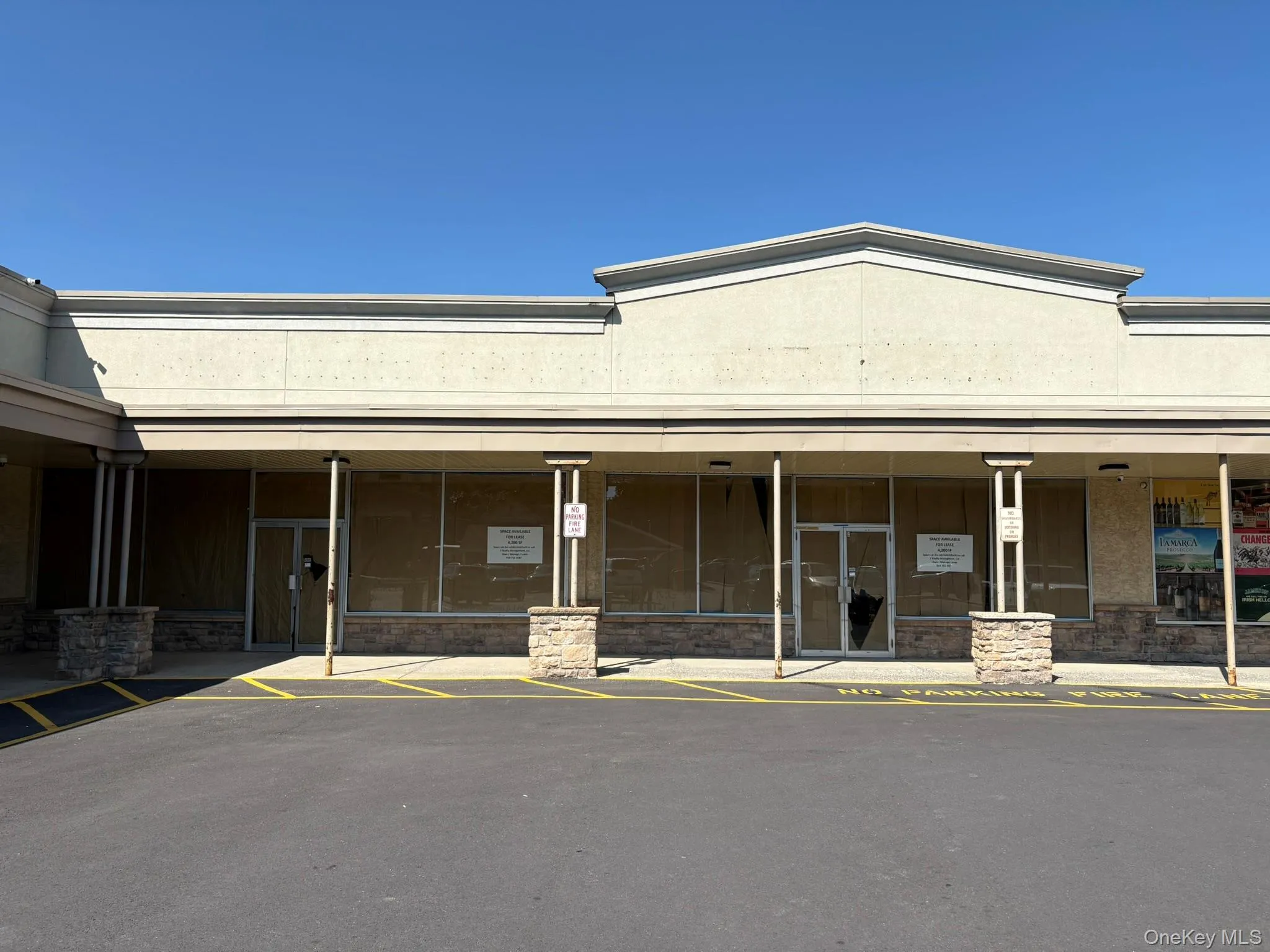 View of exterior entry with uncovered parking View of exterior entry with uncovered parking