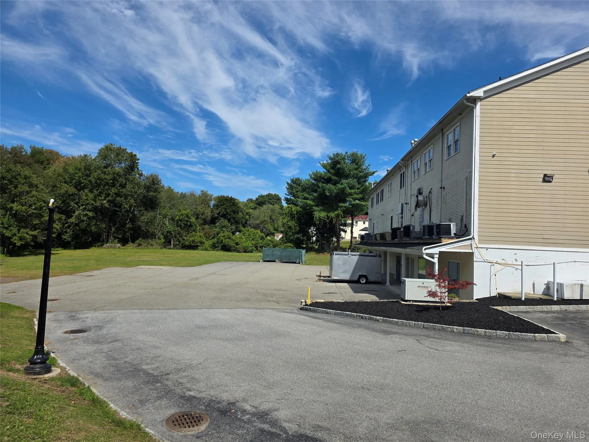View of uncovered parking lot View of uncovered parking lot