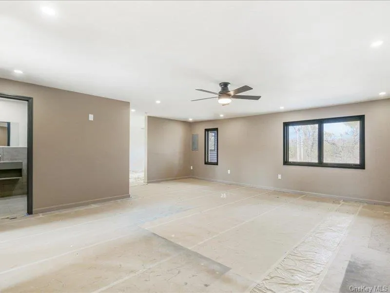 Unfurnished room featuring recessed lighting and a ceiling fan Unfurnished room featuring recessed lighting and a ceiling fan