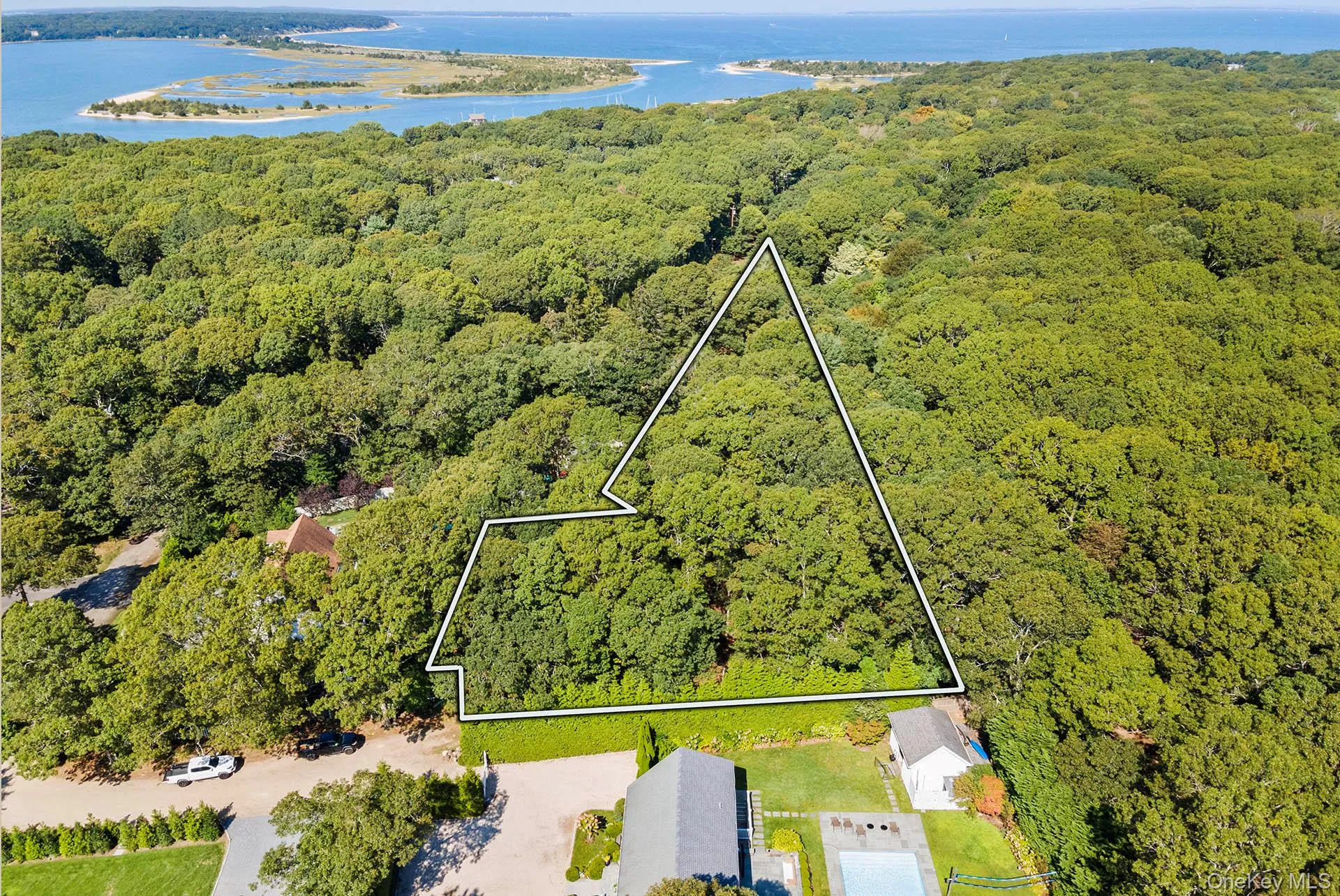 View of property location featuring property parcel outlined and a large body of water View of property location featuring property parcel outlined and a large body of water