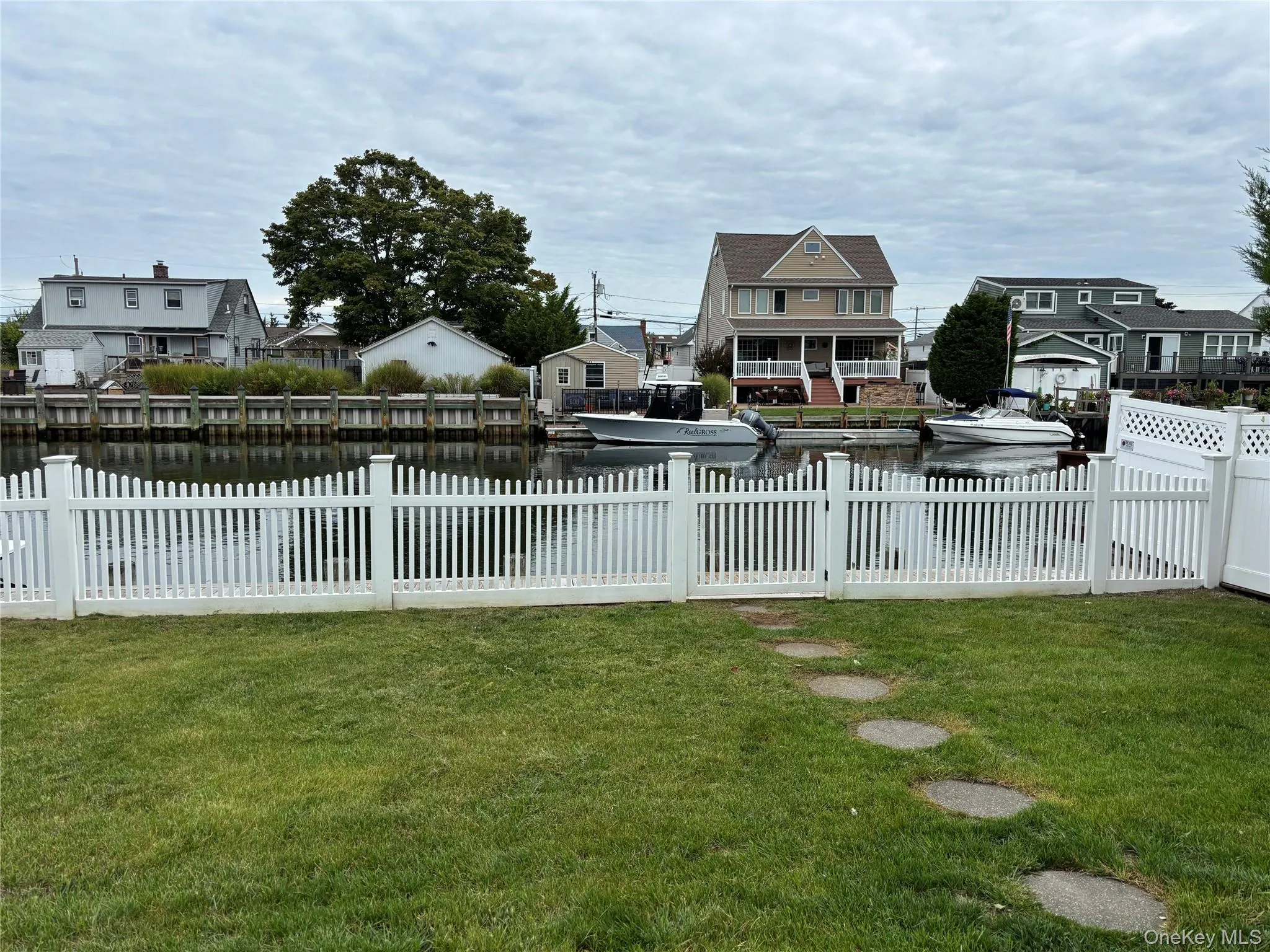 View of yard with a water view and a residential view View of yard with a water view and a residential view