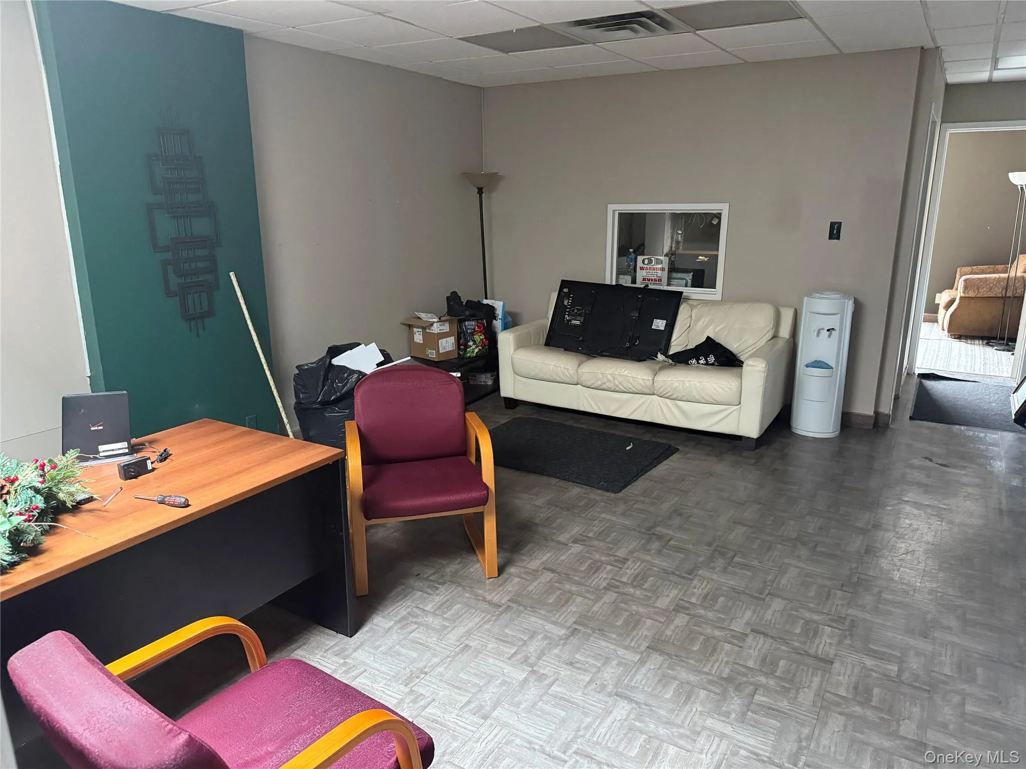 Office area with a drop ceiling Office area with a drop ceiling