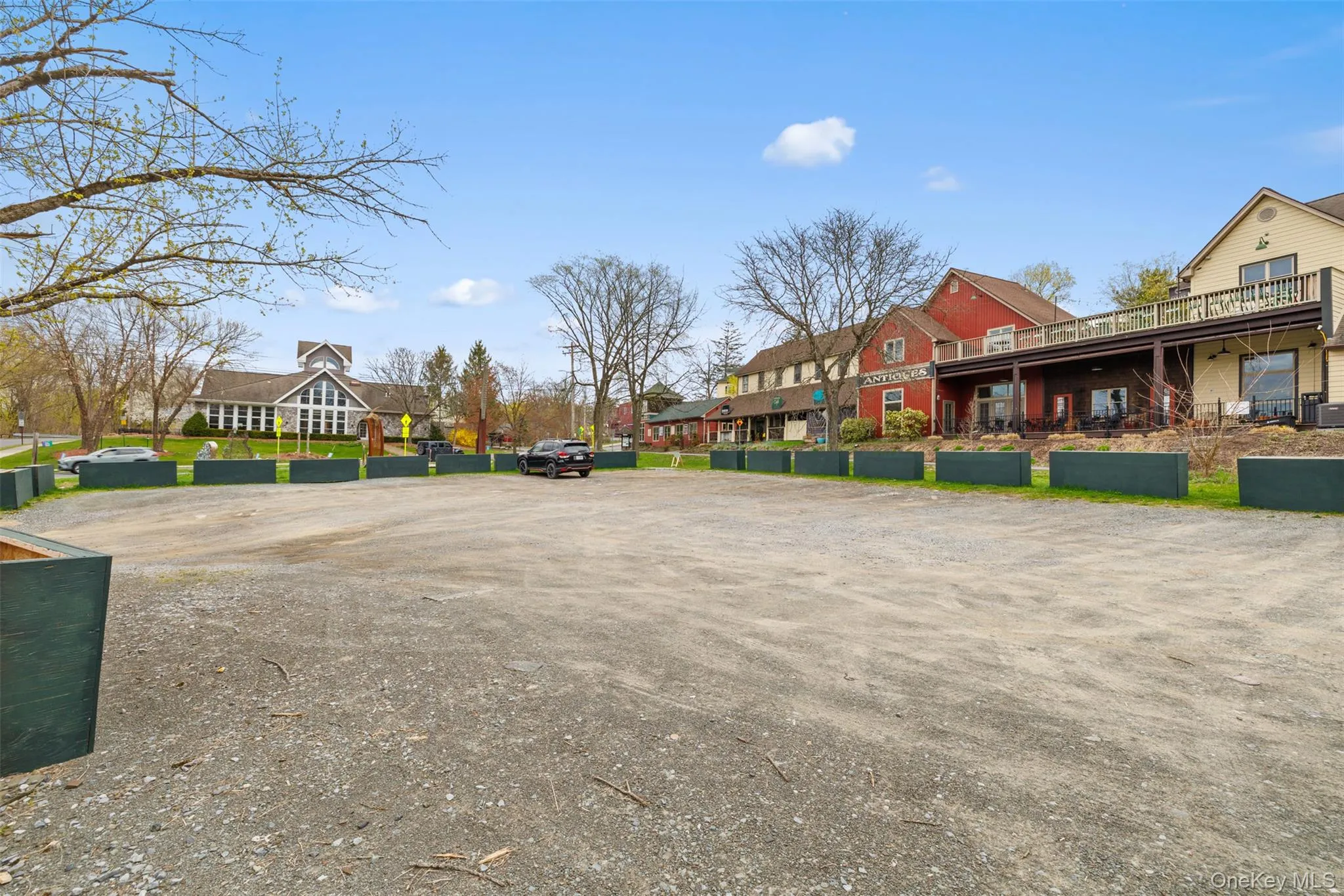 View of home's community featuring a residential view and uncovered parking View of home's community featuring a residential view and uncovered parking