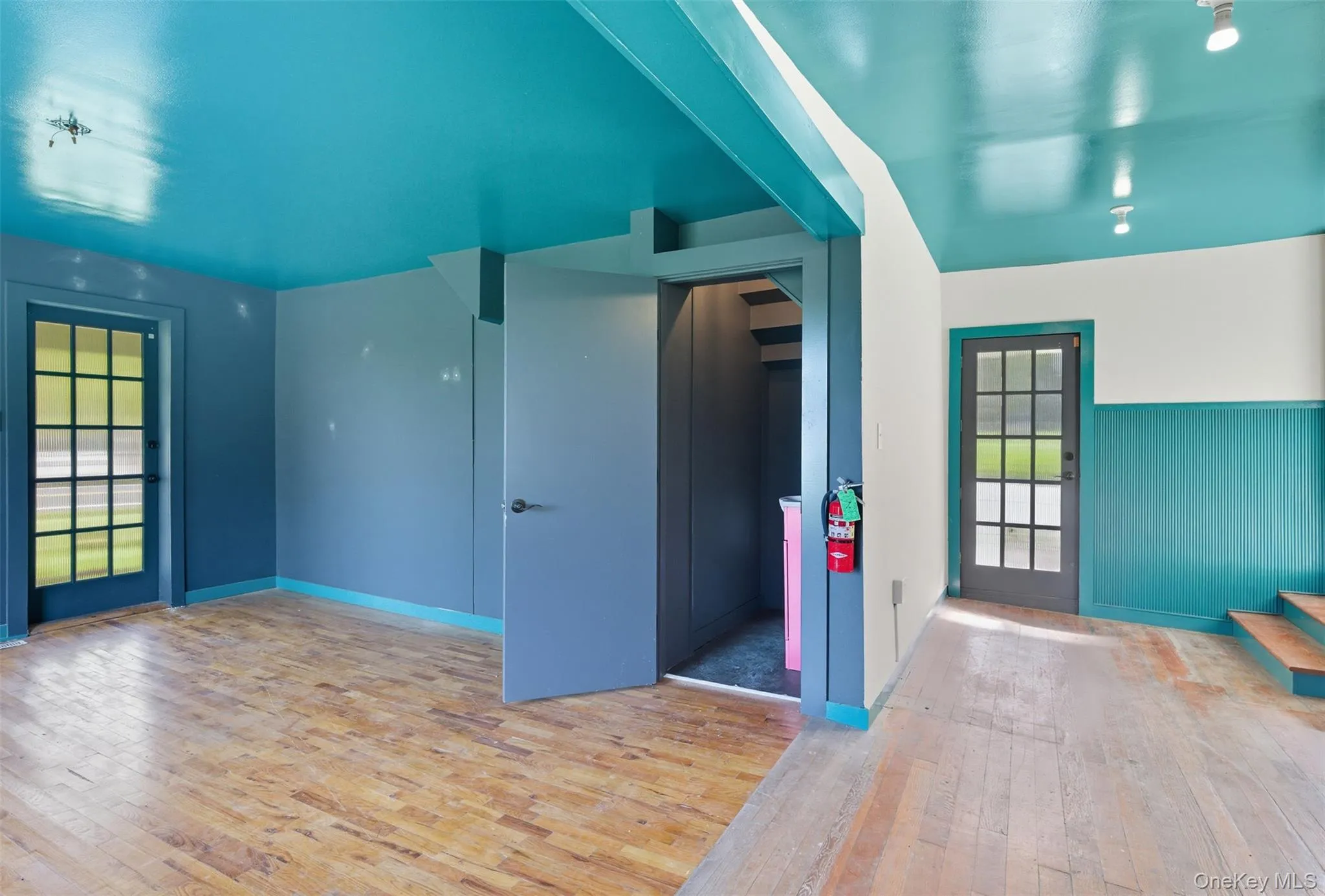 Entrance foyer with light wood-style floors and baseboards Entrance foyer with light wood-style floors and baseboards
