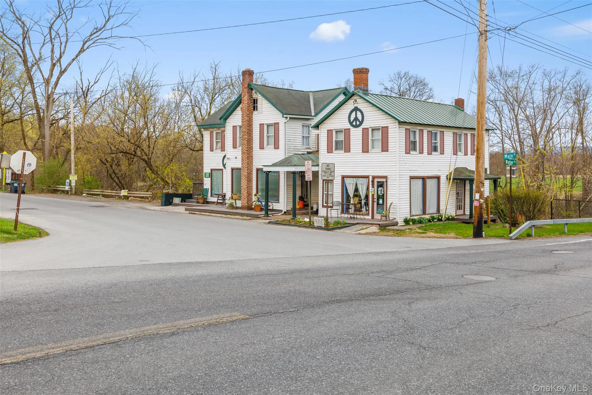 View of front of home featuring a chimney View of front of home featuring a chimney