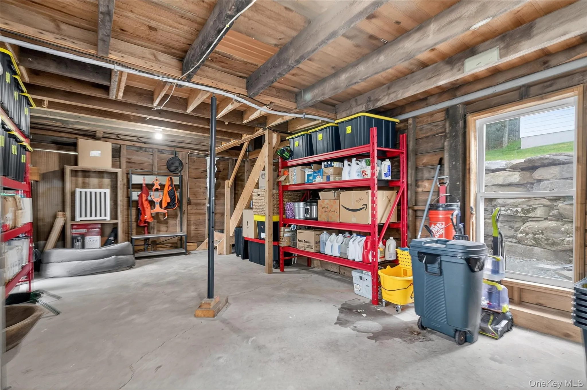 Basement featuring wooden walls Basement featuring wooden walls