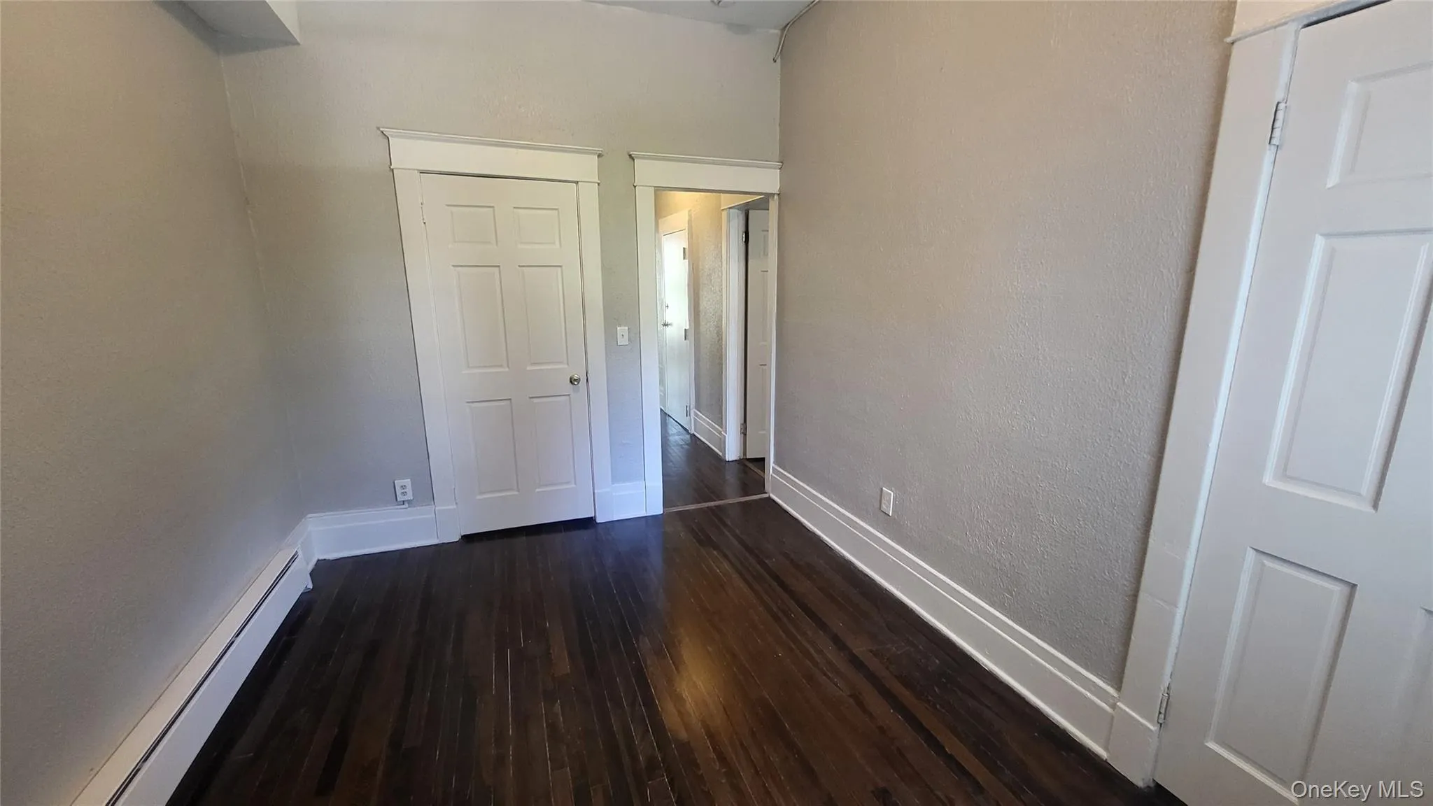 Living Room with hardwood floors and no door at entry Living Room with hardwood floors and no door at entry