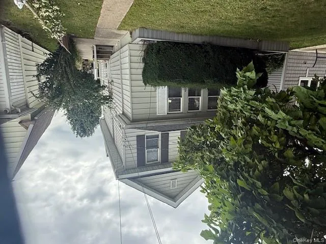 View of home's exterior with a lawn View of home's exterior with a lawn