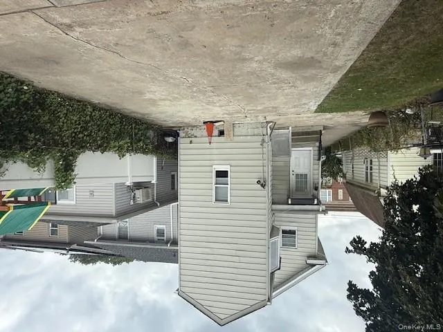 Back of property with a patio Back of property with a patio