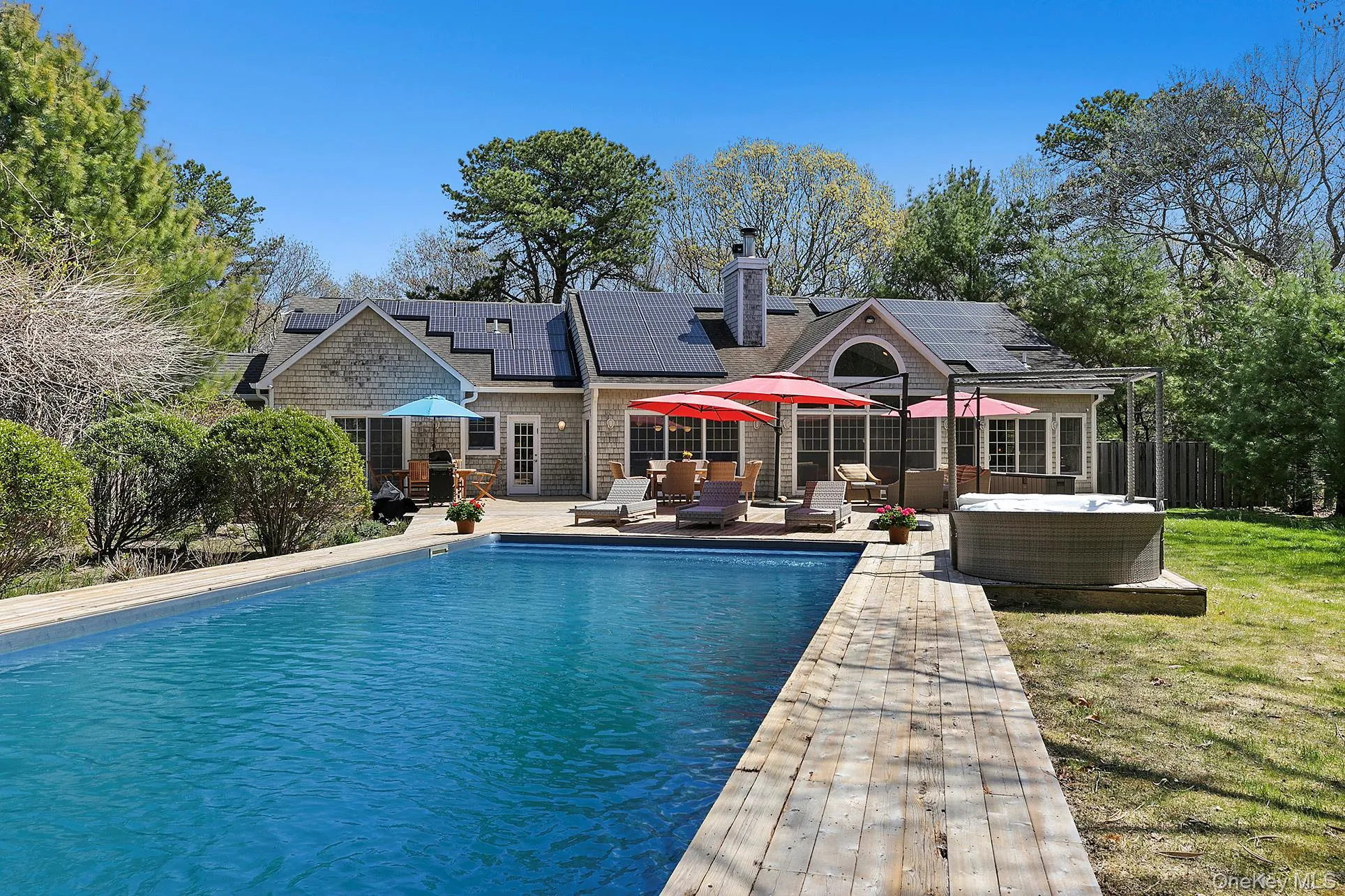View of swimming pool featuring an outdoor living space, a patio, and a yard View of swimming pool featuring an outdoor living space, a patio, and a yard
