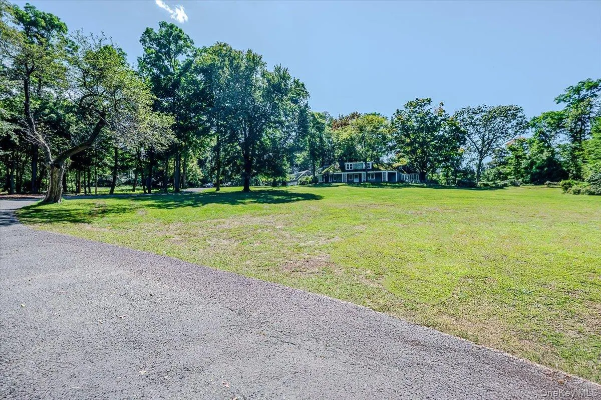 View of community featuring a lawn View of community featuring a lawn