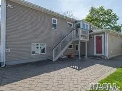 Rear view of property with stairway, a patio area, and a deck Rear view of property with stairway, a patio area, and a deck
