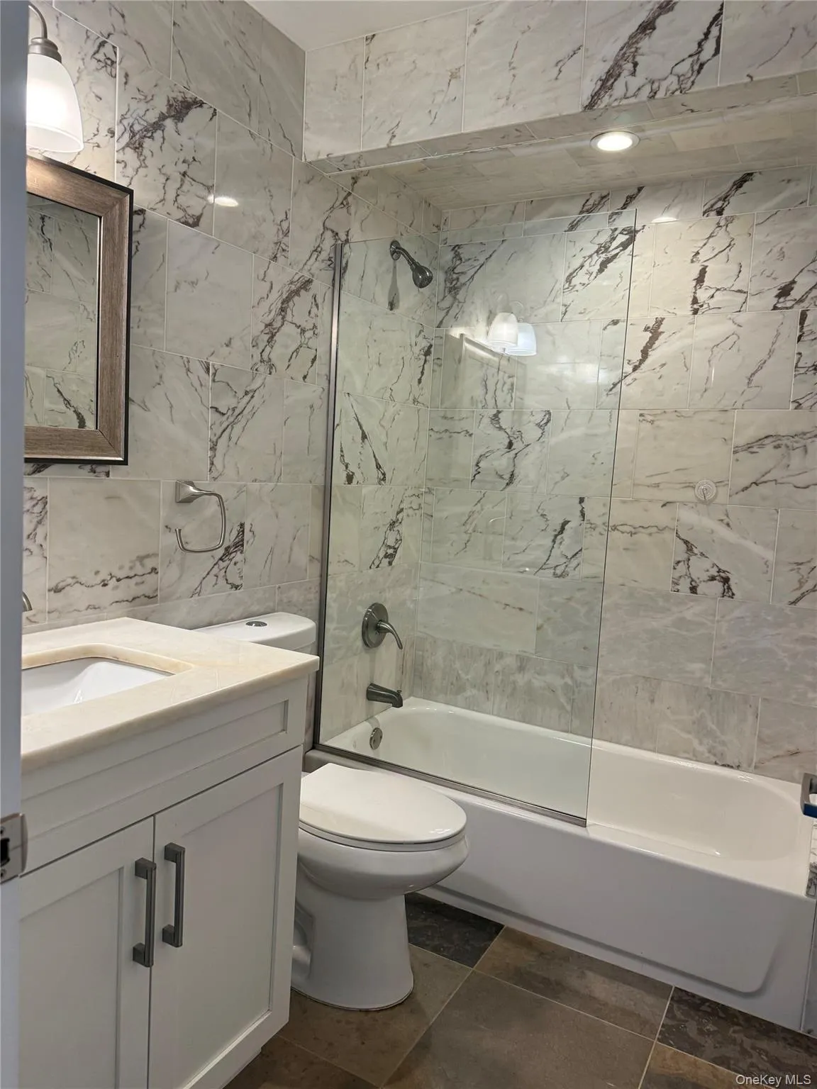 Fully updated and elegant bathroom with marble and other high end finishes Fully updated and elegant bathroom with marble and other high end finishes
