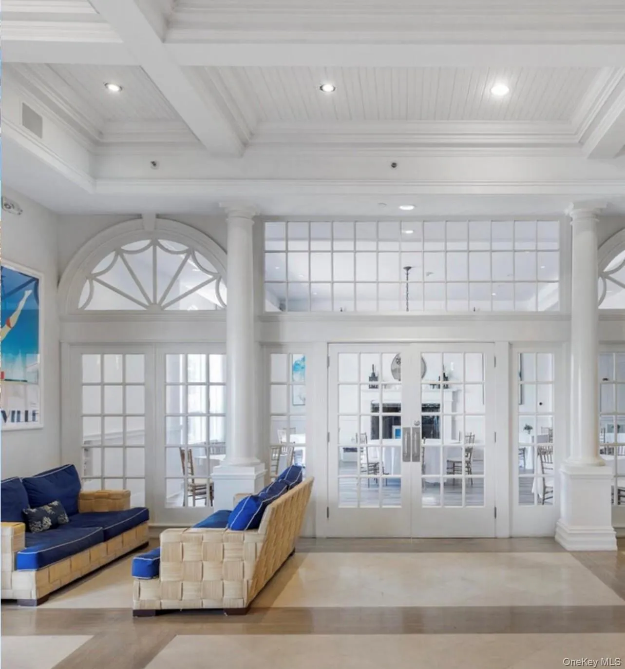 Lobby with beamed ceiling, ornamental molding, and recessed lighting Lobby with beamed ceiling, ornamental molding, and recessed lighting