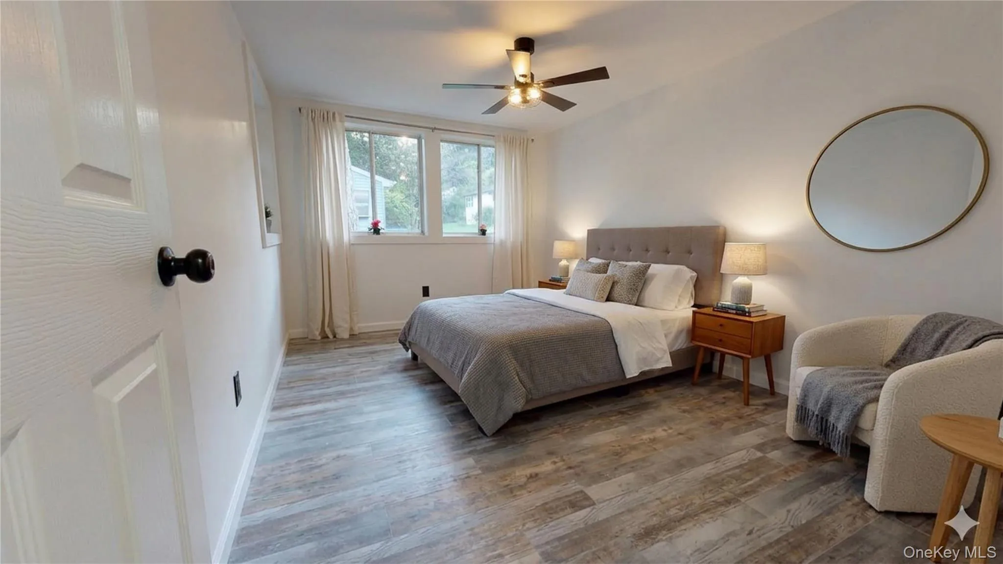 Virtual staging of the primary bed space with furniture. Original photo in following picture. Virtual staging of the primary bed space with furniture. Original photo in following picture.
