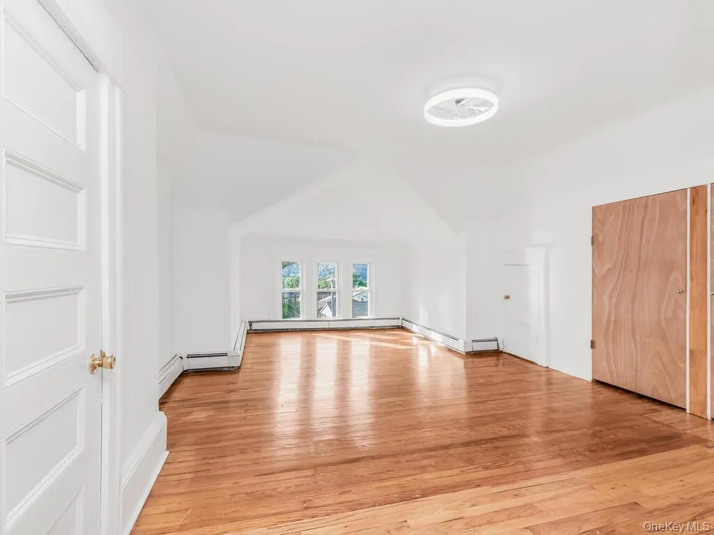 Additional living space featuring light wood-style floors Additional living space featuring light wood-style floors