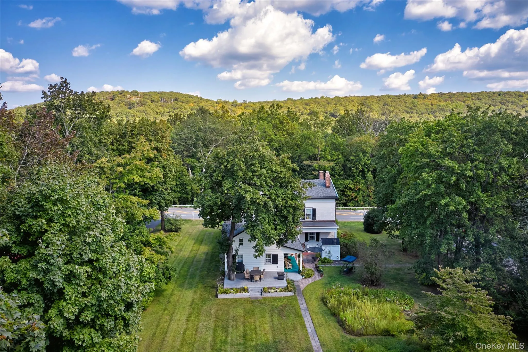 View of subject property featuring a forest View of subject property featuring a forest