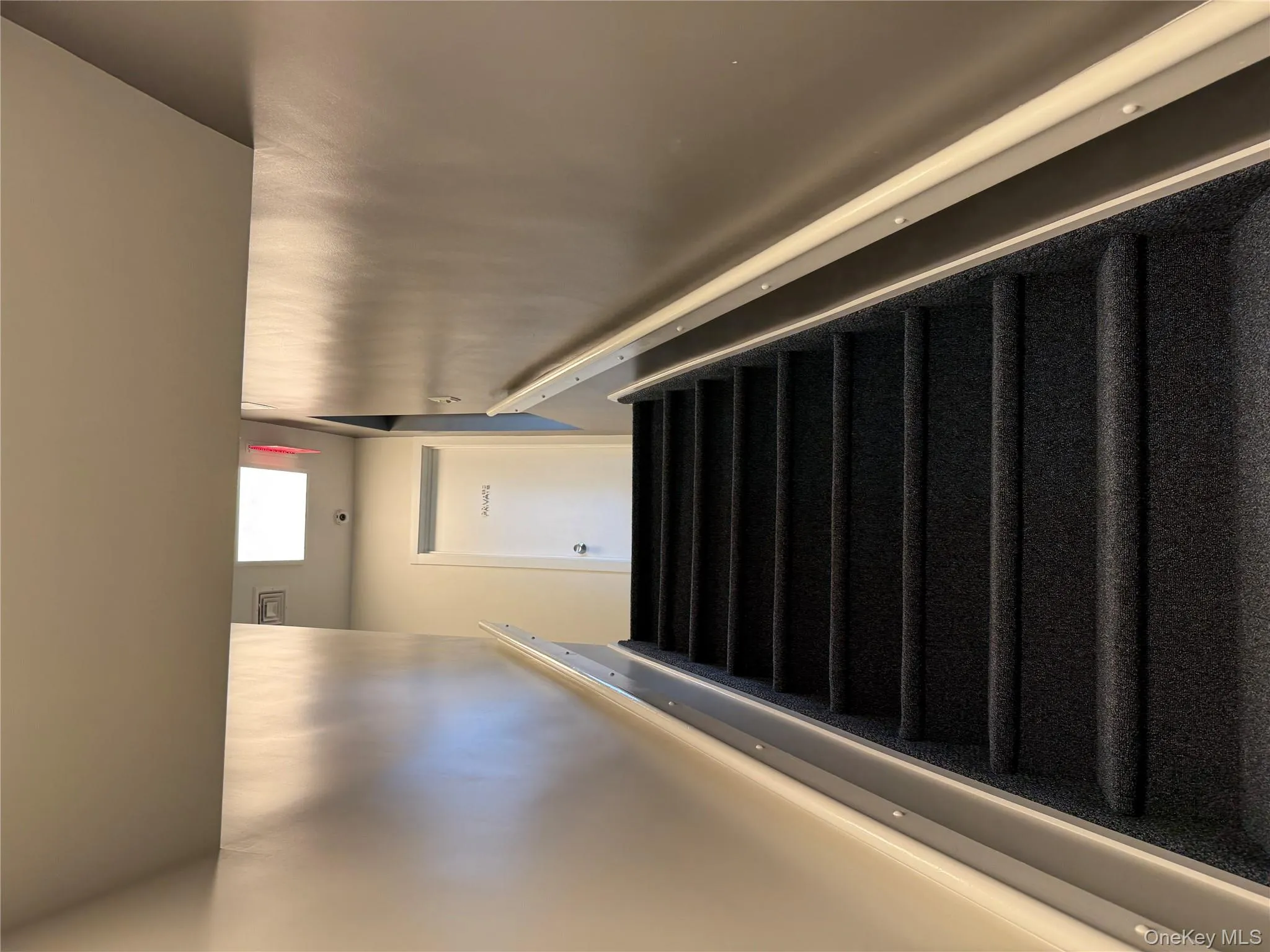 Stairway featuring a skylight Stairway featuring a skylight