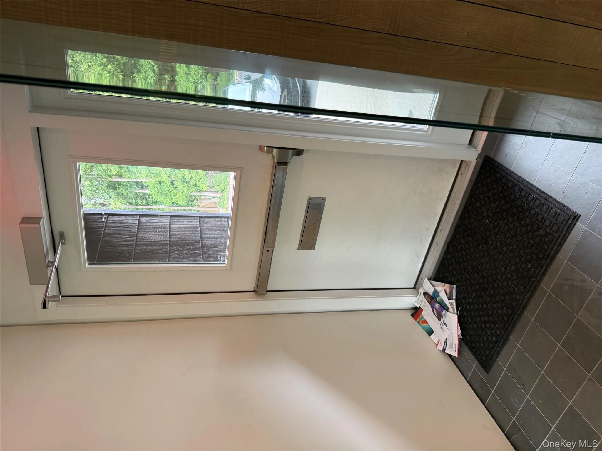 Entryway featuring tile patterned floors Entryway featuring tile patterned floors