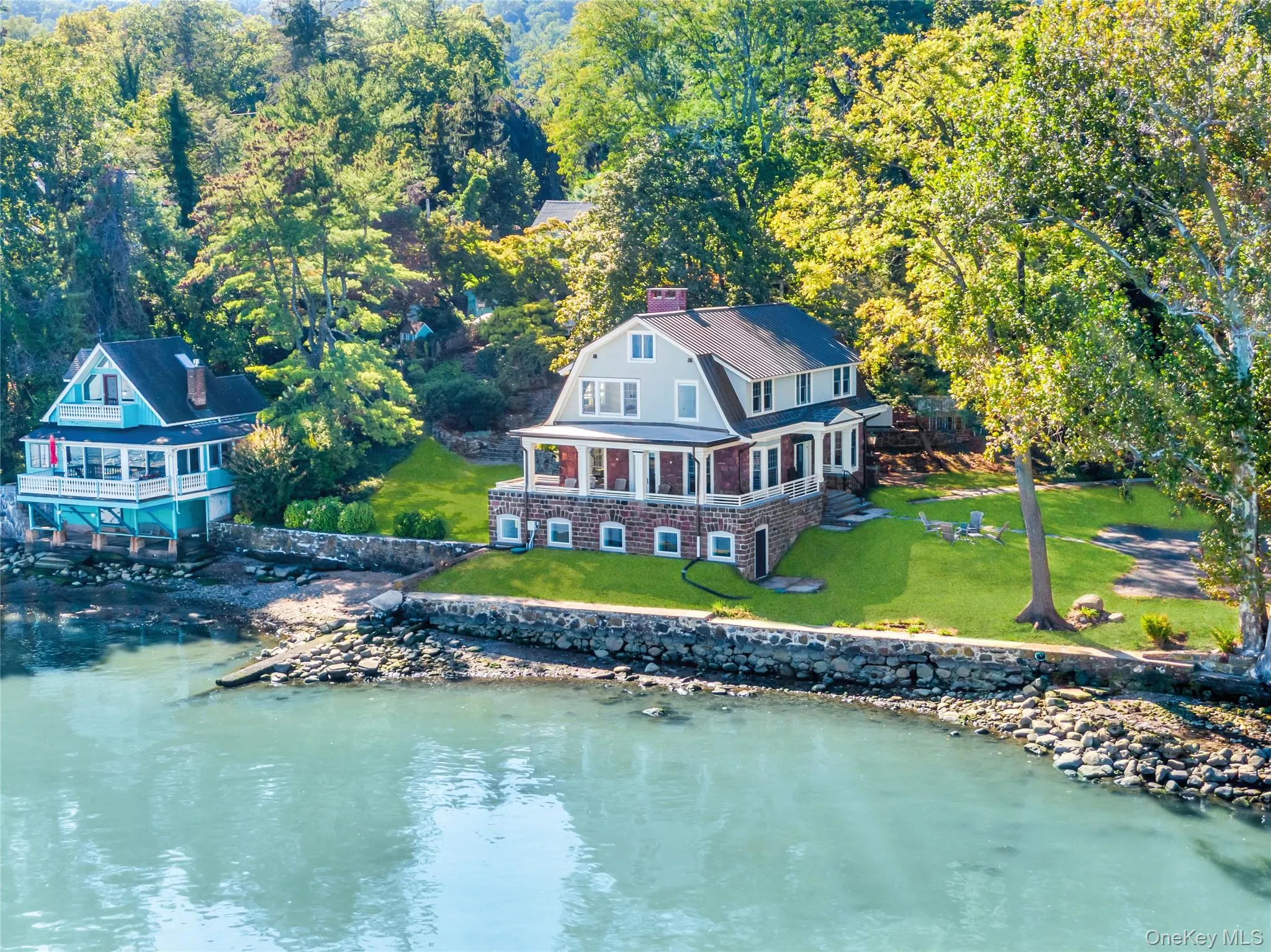 View from above of property with a large body of water View from above of property with a large body of water